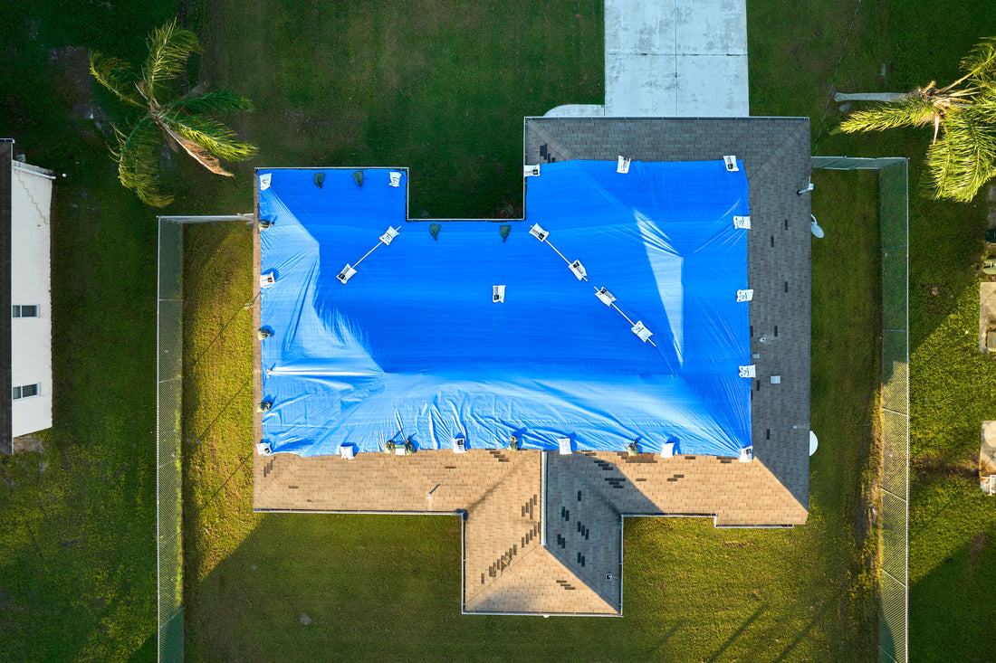 image of tarps using for roofing construction