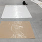 Image of employees working on 40x40 White & Beige Tarps in Warehouse-Supreme Tarps